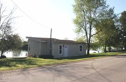 Au Sable Cottage | Steps from the Au Sable! Riverview cottage just minutes from Downtown Oscoda