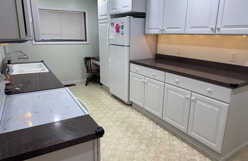 Cheboygan House | Steps from your snowmobile adventure! Cabin feel in the City Book while you can!
