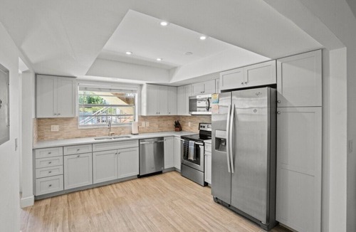 Palm Beach Shores House | Steps to Beach! HOT TUB! 4 condos in 1- Perfect for Groups
