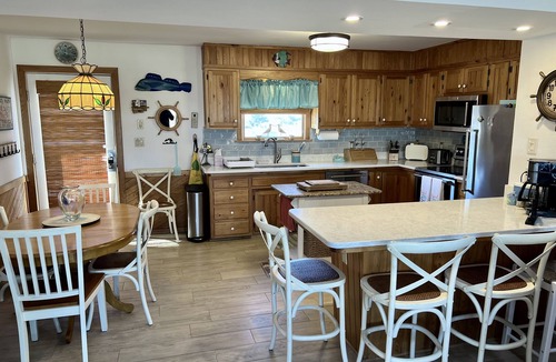 Colington House | Steps to the Sand! Ocean Views! Hot tub! Specials! Dogs! KD0223