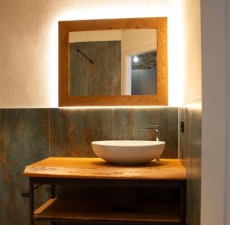 Cormons House | Stevoski Rooms - Modern Comfort in a Historic Stone House