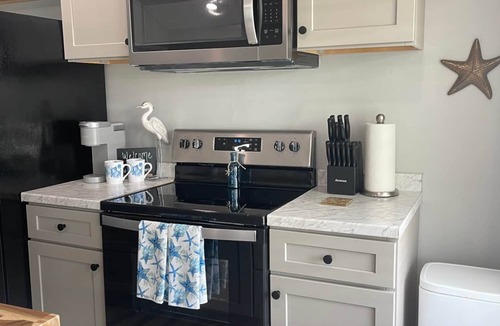 Grand Isle Cabin | Still Waters