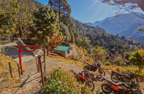 Naina Range House | Stone Age Huts and Hostel