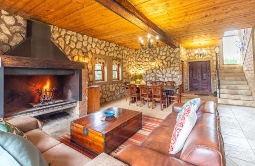 Wilderness House | Stone Cottage - River front - Fireplace - Firepit