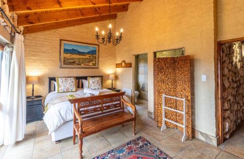 Wilderness House | Stone Cottage - River front - Fireplace - Firepit
