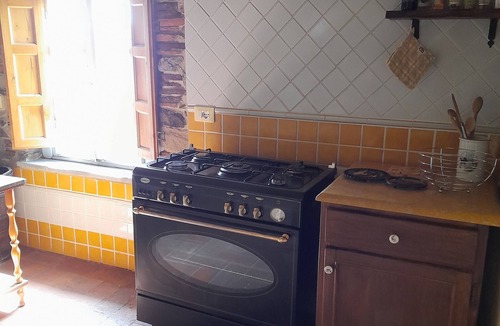 Boveglio Apartment | Stone Rustico with garden in an ancient village in Tuscany. View on ancient Pieve