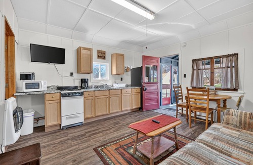 Curtis Cabin | Stone's Throw Cabin 2- Cozy one bedroom with full kitchen and screened porch