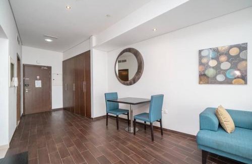 Dubai Sports City Apartment | StoneTree - Spacious Studio - The Matrix