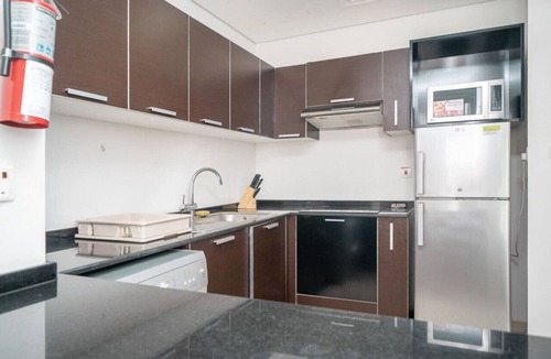 Dubai Sports City Apartment | StoneTree - The Matrix Studio - Spacious Apartment