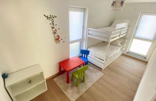 Ichenhausen Apartment | Strahlende Erdgeschoss-Wohnung im Neubau nähe Legoland