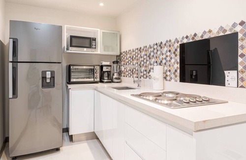 Playa Langosta Apartment | Studio across the street from beach, top location