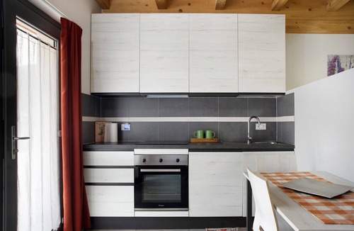 Valtellina Apartment | Studio apartment 'Agriturismo L'isola Del Cavallo 3' with Mountain View, Shared Garden and Wi-Fi