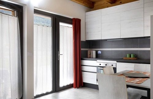 Valtellina Apartment | Studio apartment 'Agriturismo L'isola Del Cavallo 3' with Mountain View, Shared Garden and Wi-Fi