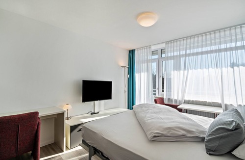 Furstenfeldbruck District Apartment | Studio Apartment 'Huber Living Basic 103' with Balcony and Wi-Fi