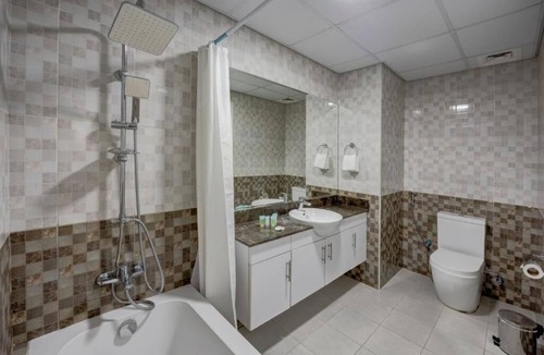 Dubai Investment Park Hotel | Studio Apartment Near Dunes Village Dip By Luxury Bookings