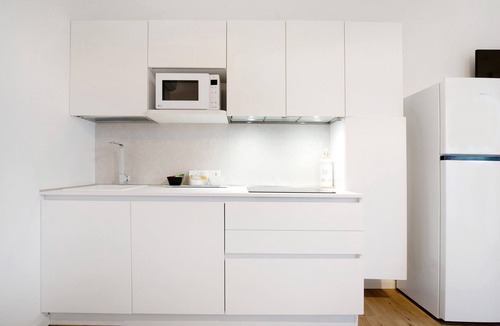Lido di Jesolo Apartment | Studio Apartment 'Open Space 1' with Shared Garden, Wi-Fi and Air Conditioning