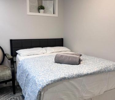 Milton Apartment | Studio Basement Suite with Double Bed and kitchen, Entrance from Garage