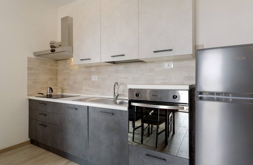 Zignago Apartment | Studio 'Camera 4' with Mountain View, Wi-Fi and Air Conditioning