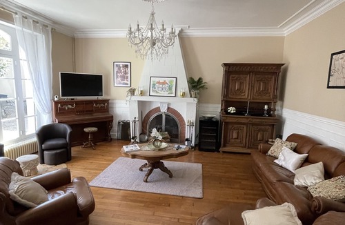 Excideuil Apartment | Studio king size bed, kitchen, living/dining room.