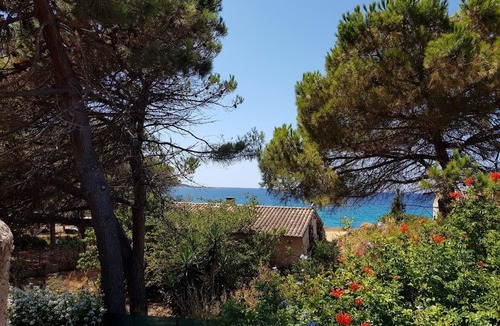 Molini Condo | Studio sur Terrasse et Jardin Clos Bord de mer