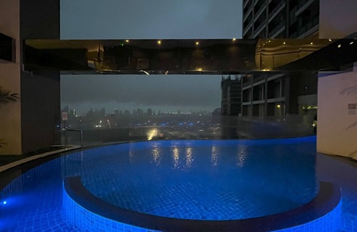 Downtown Condo | Studio type Condo with City View, FAST WIFI, 55” TV, Gym, Pool, & near Nightlife