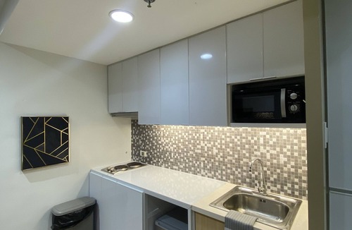 Silang Junction North Condo | Studio unit - NA Suites at Pine Suites Tagaytay. Pet friendly!