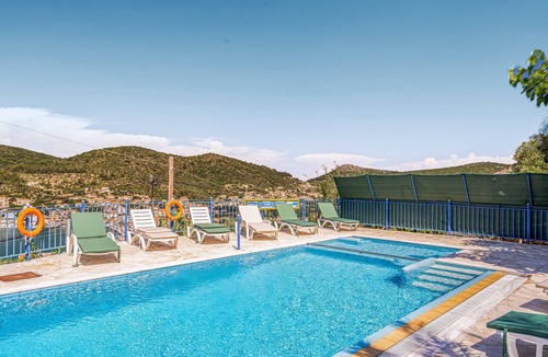 Vathy Apartment | Studio 'Veronis 2' with Sea View, Shared Pool & Wi-Fi