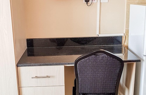 Langata Apartment | Studio with King Size Bed,Elevator,WIFI&Parking near City, JKIA&Wilson Airport.