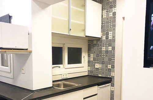 Paseo de Almeria Apartment | Studio with kitchen and private bathroom.