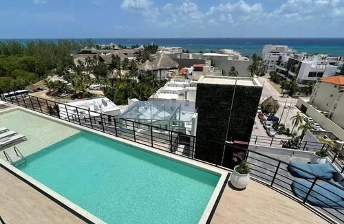 Zazil-ha Apartment | Studio with Rooftop Pool | Steps from the Beach
