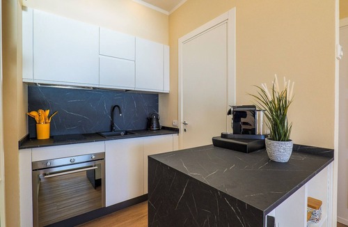 Susello Apartment | Studio with terrace and garden in a residence with pool