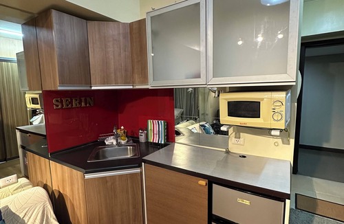 Silang Junction South Condo | StudioCo - Tagaytay Staycation with AC, WiFi & Netflix access accessible
