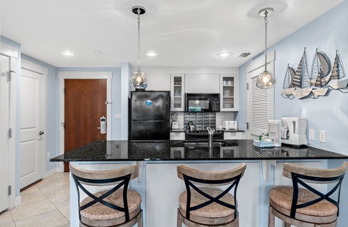 Baytowne Wharf Condo | Stunning 2BR Bahia Condo at Wharf! Beach Tram, Tropical Pool, Hot Tub, Patio.