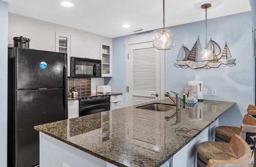Baytowne Wharf Condo | Stunning 2BR Bahia Condo at Wharf! Beach Tram, Tropical Pool, Hot Tub, Patio.