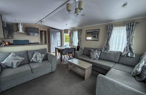 Layer Marney House | Stunning caravan at West Mersea Park with decking ref 75192WM