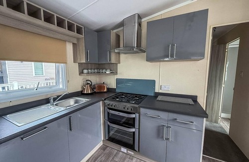 Layer Marney House | Stunning caravan at West Mersea Park with decking ref 75192WM