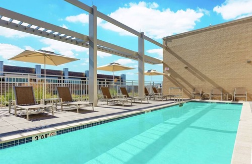 West End House | Stunning City Retreat Steps Away from White House | Rooftop Pool Access