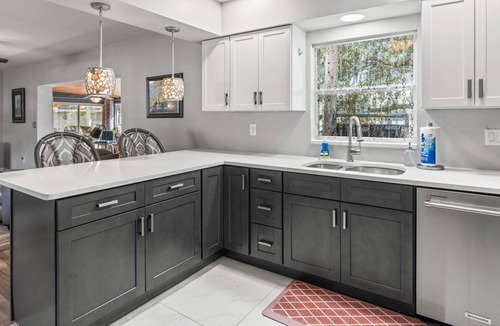 Riverview House | Stunning Inside and Out - Remodeled 3BR Riverfront Home with Hot Tub, Kayaks and Access to the Gulf