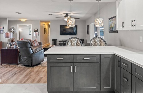 Riverview House | Stunning Inside and Out - Remodeled 3BR Riverfront Home with Hot Tub, Kayaks and Access to the Gulf