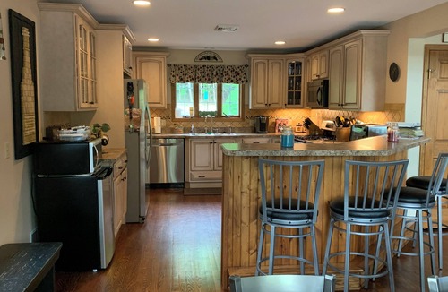 Blakeslee House | Stunning Lake Front Home, Near Ski Slopes, Fireplace, Hot Tub, Firepit, Boats