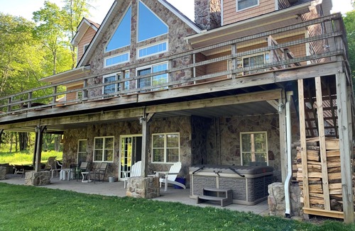 Blakeslee House | Stunning Lake Front Home, Near Ski Slopes, Fireplace, Hot Tub, Firepit, Boats