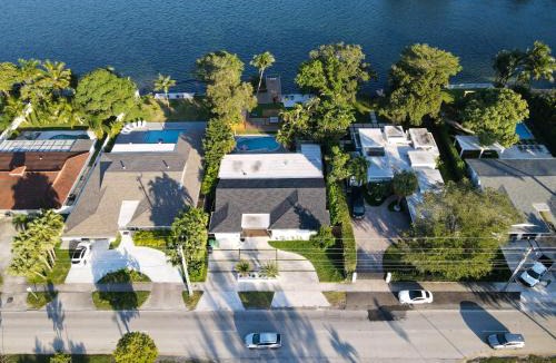 North Miami Beach Villa | Stunning Lakefront Villa - Deck, Pool, Kayak, PaddleBs