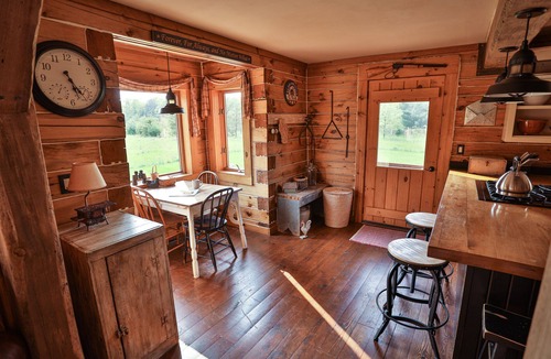 Nekoosa House | Stunning Log Cabin in native prairie woodland setting