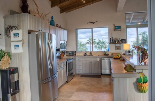 Savannah Sound House | Stunning, Private, Pink Sand, Beachfront Estate with 70ft dock on Bonefish Flats