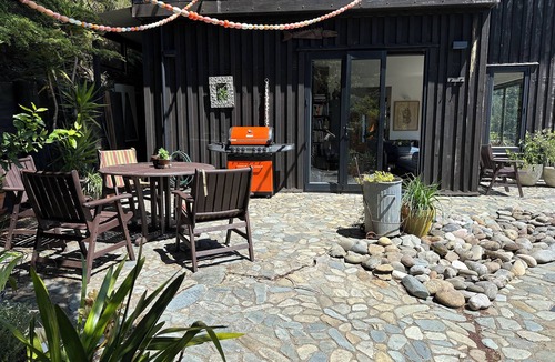Whatamango Bay House | Stunning sea views from every room, an art filled retreat & drive on access