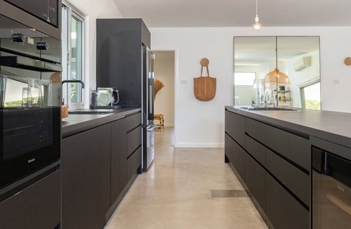 Elizabeth Beach House | Stunning, Sleek and Refined, The Black Beach House is perfection from the time you walk through the