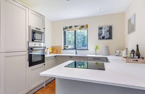 Menai Bridge Ski Chalet | Stunning two storey contemporary lodge on the edge of the lake.