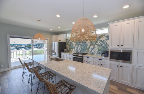 Long Neck House | Stunning-waterfront, beach, pools, family fun