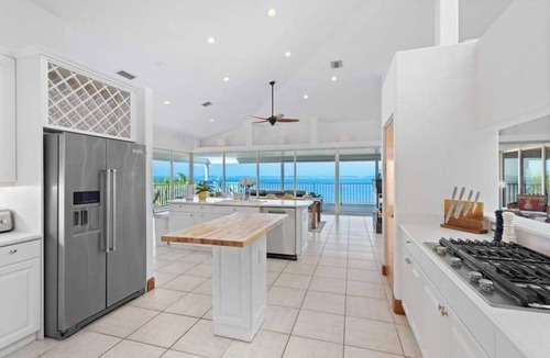 Bayshore Gardens House | Stunning waterfront retreat w/panoramic view, spectacular sunsets & Heated pool