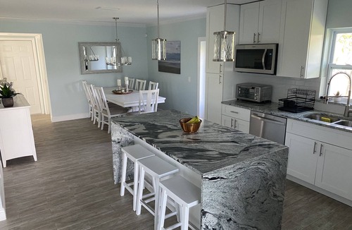 North Naples House | Stunning Waterfront Retreat with Private Pool and beautiful entertaining space.